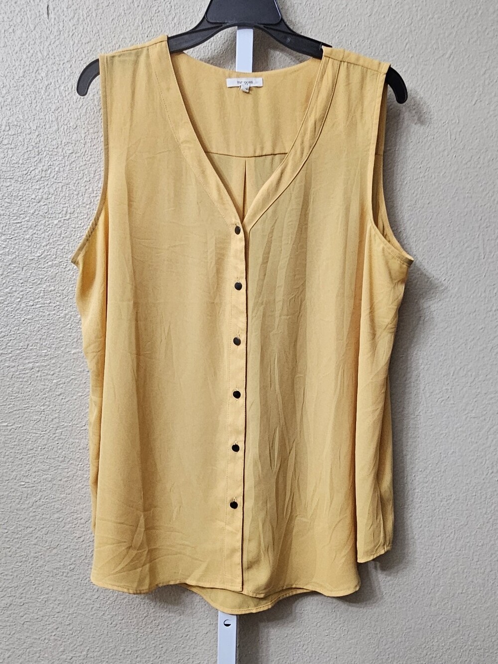 Maurices Madison Solid Button Down Tank Top in a mustard yellow hue.